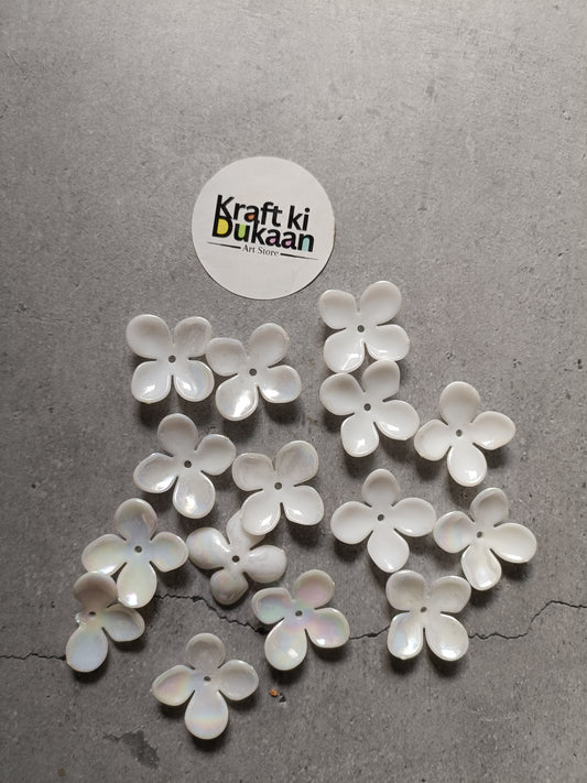 4-kali flower beads, white, 50-pack—multiple flower shapes laid out