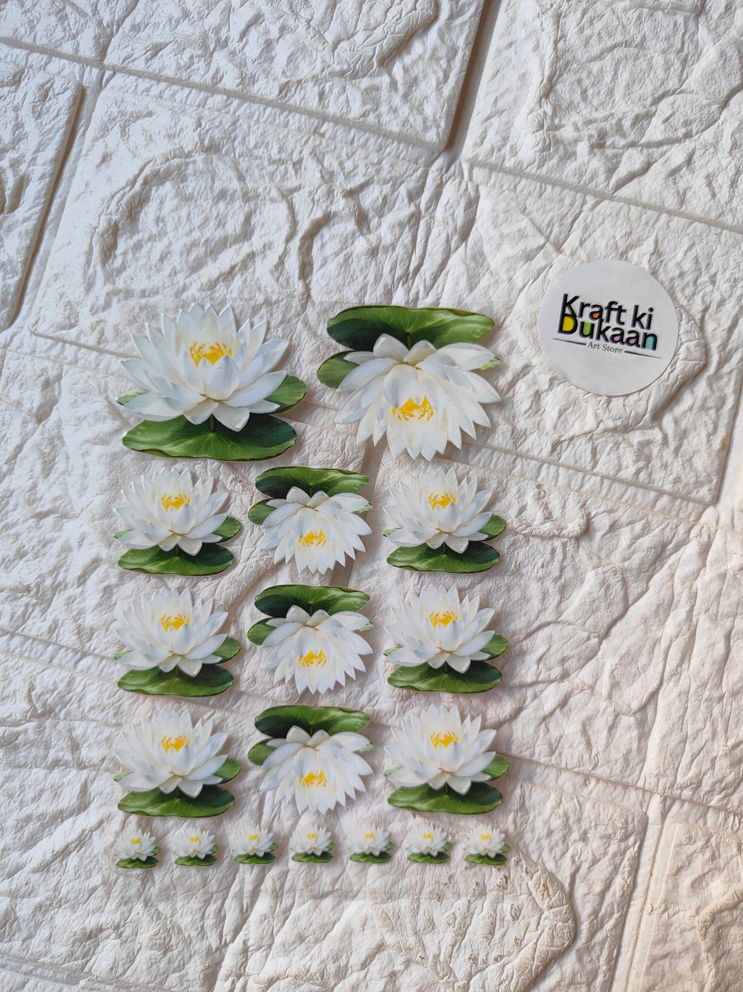 Peel-off sticker sheet with white daisy flowers, yellow centers, and green leaves