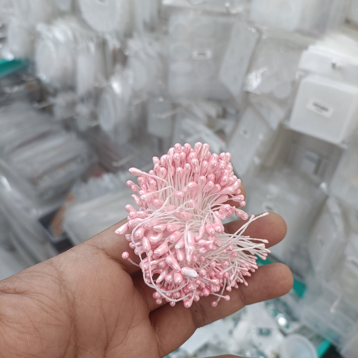 Artificial pollen bunch, light pink bead-like tips on thin white stems