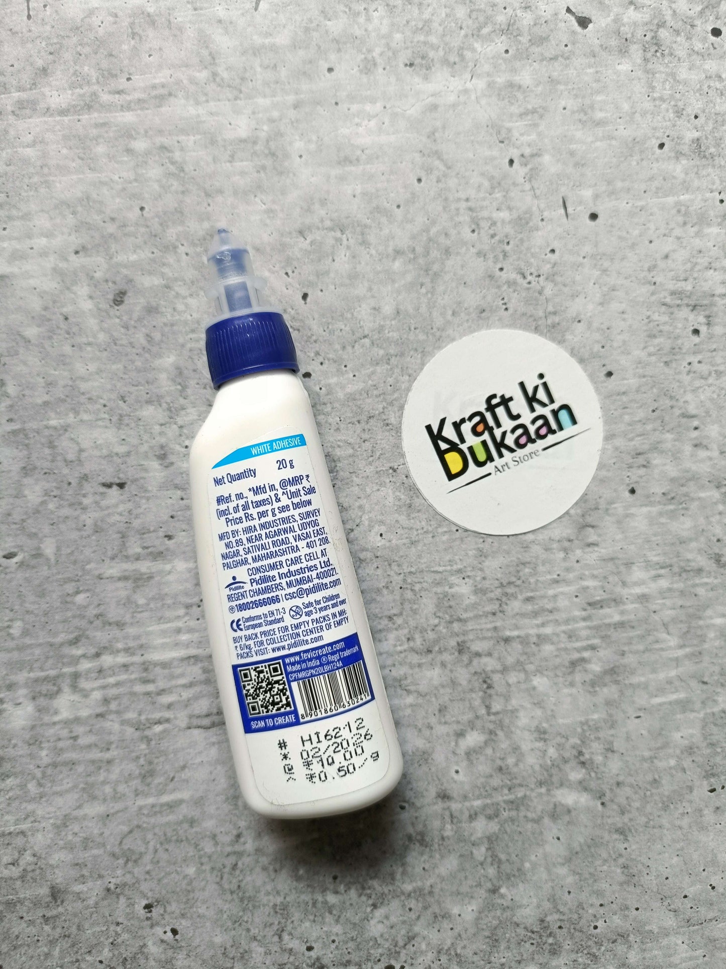 Fevicol MR white glue bottle back label with barcode and QR code