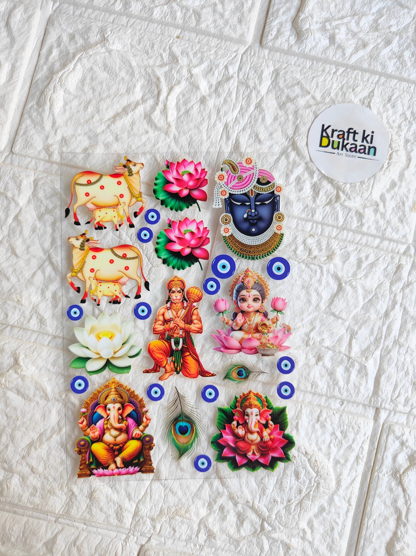 Peel-off sticker sheet with colorful deity and lotus designs, multiple cutouts