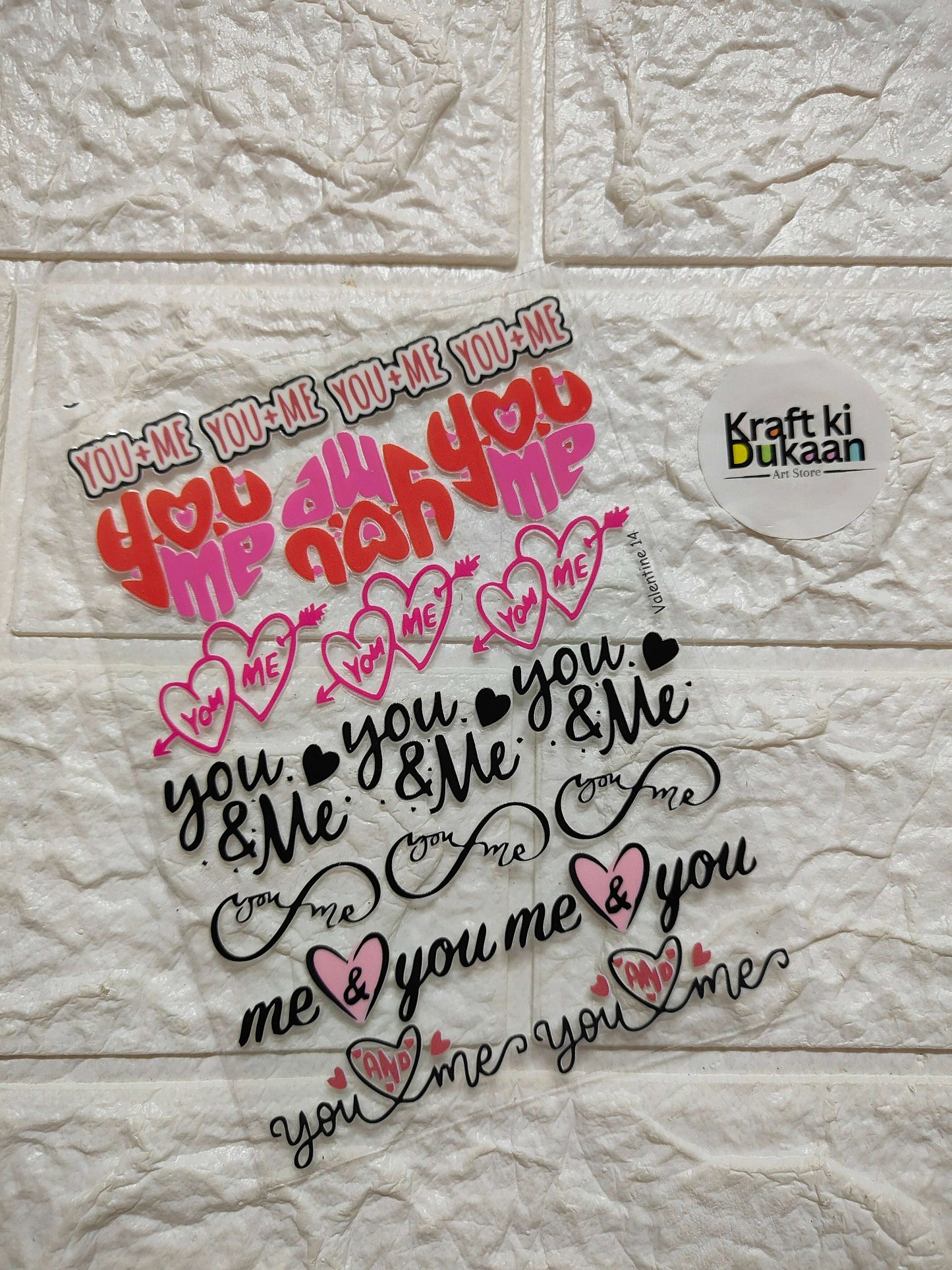Peel-off sticker sheet with heart 'You+Me' lettering and icons