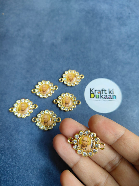 Rakhi bracelet pendant set of 6; gold-tone flower pendant with deity face in hand