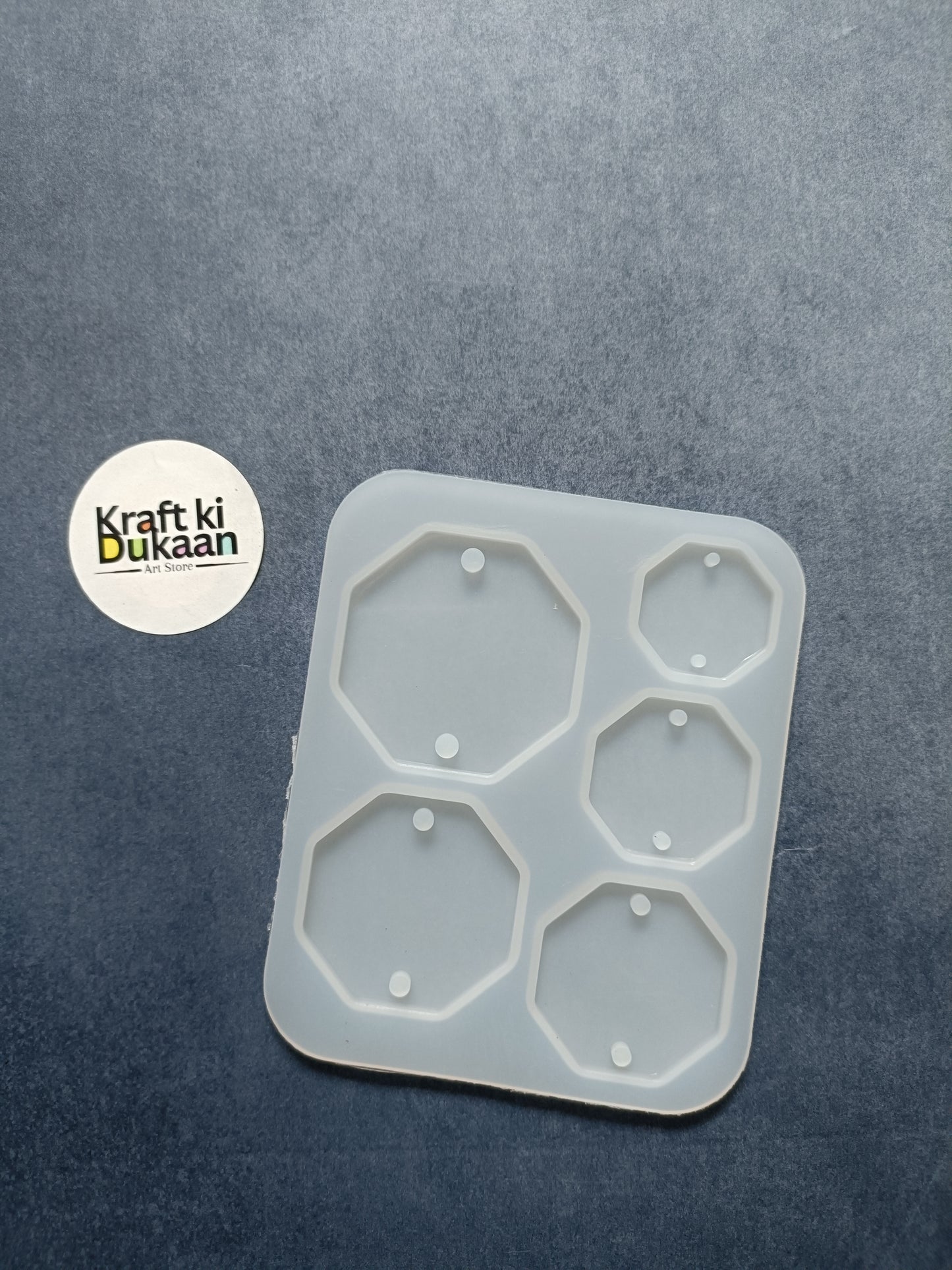 Octagon 5-cavity rakhi mould with five hexagonal compartments and raised edges