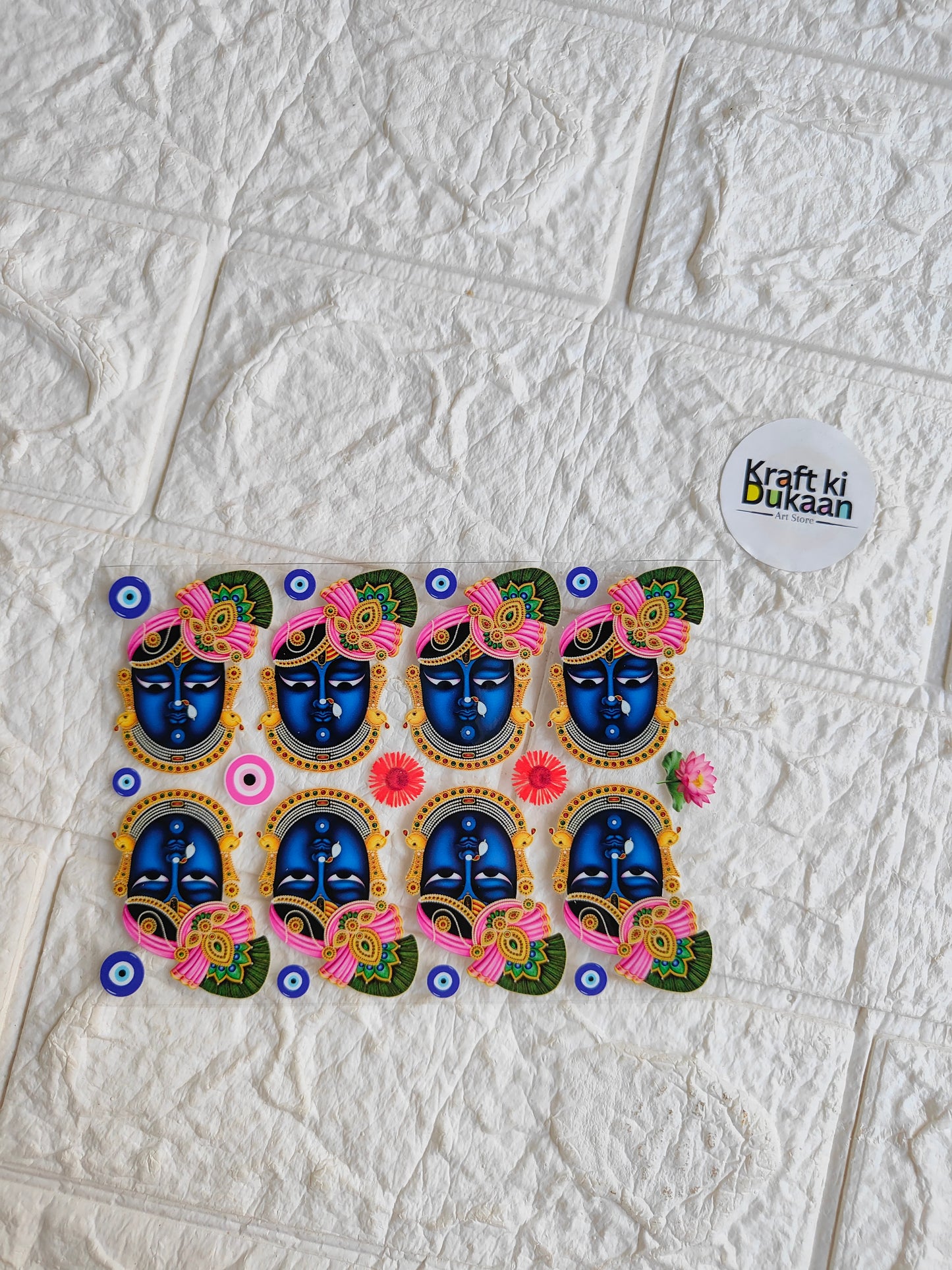 Peel-off sticker sheet with eight colorful ornate face designs