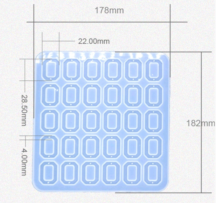 Blue 30-cavity rectangular jewelry mould with 6x5 cavity grid and outlined impressions