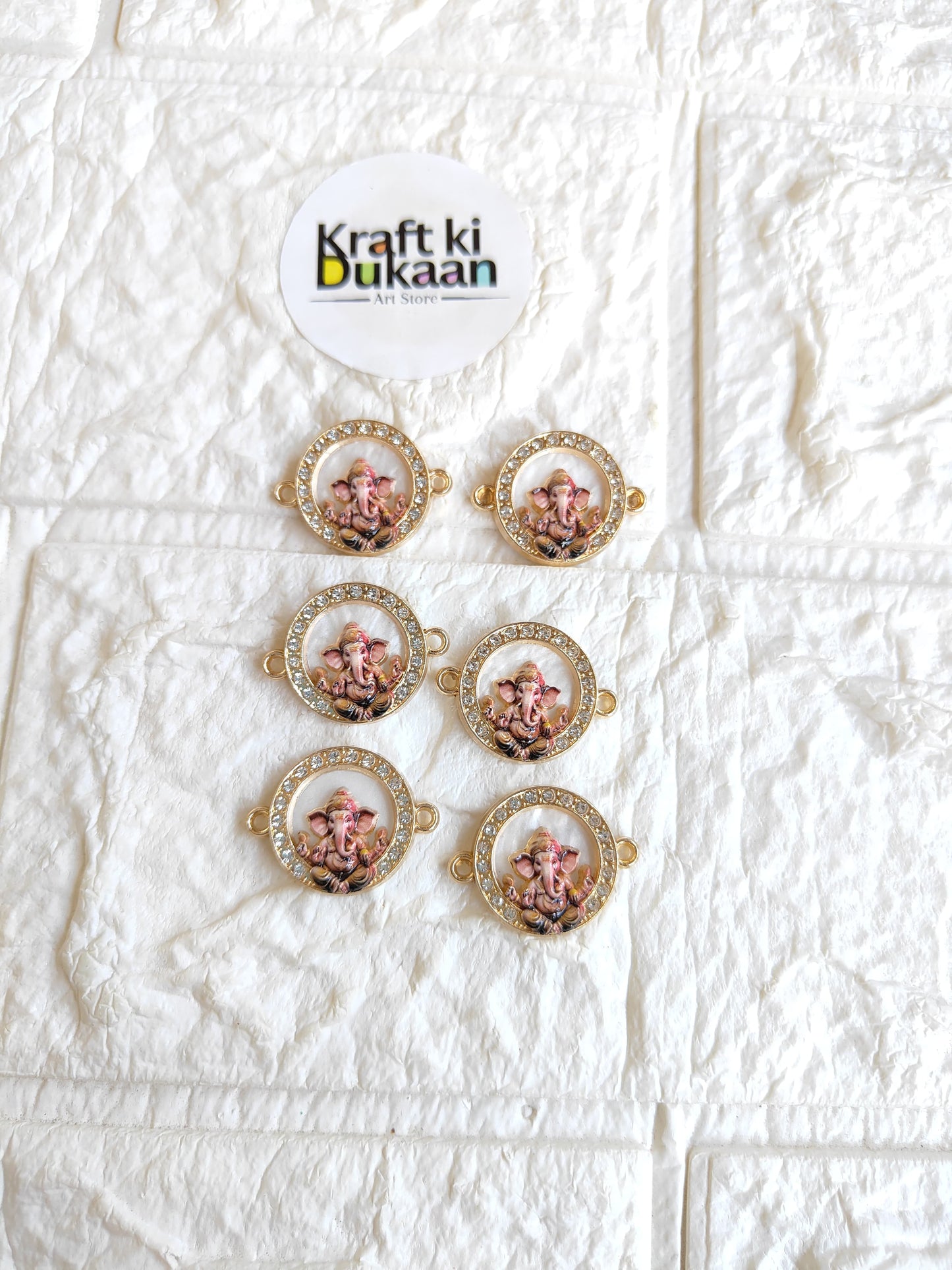 Rakhi bracelet pendant set of 5, round gold-toned frames with printed deity images