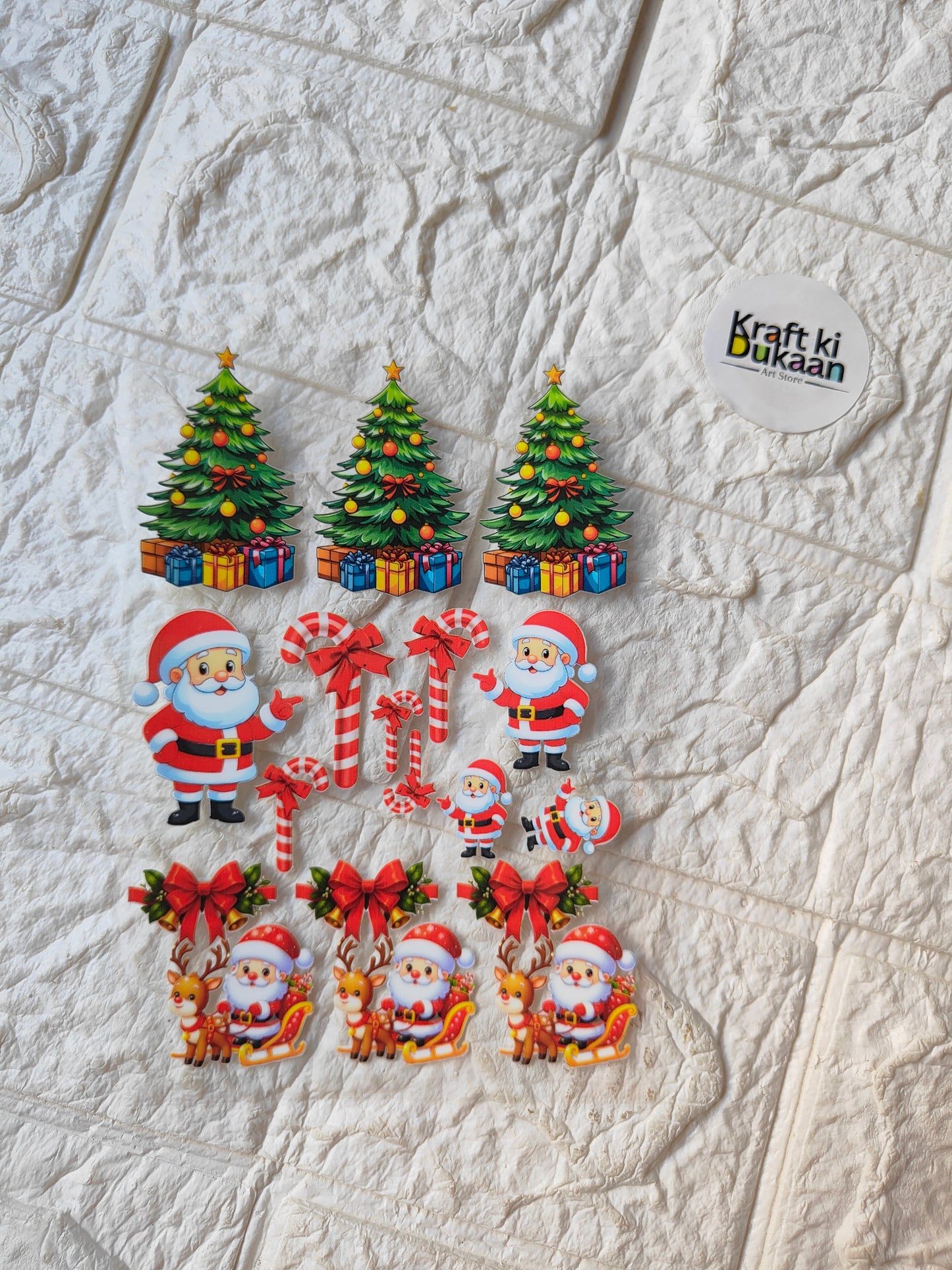 Christmas sticker sheet with trees, Santas, candy canes, and red bow motifs