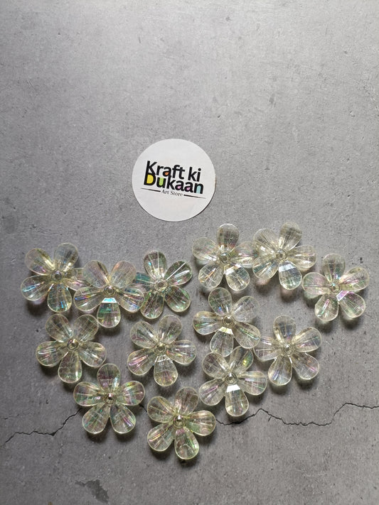 Rainbow flower beads pack laid out, clear iridescent 5-petal flower beads