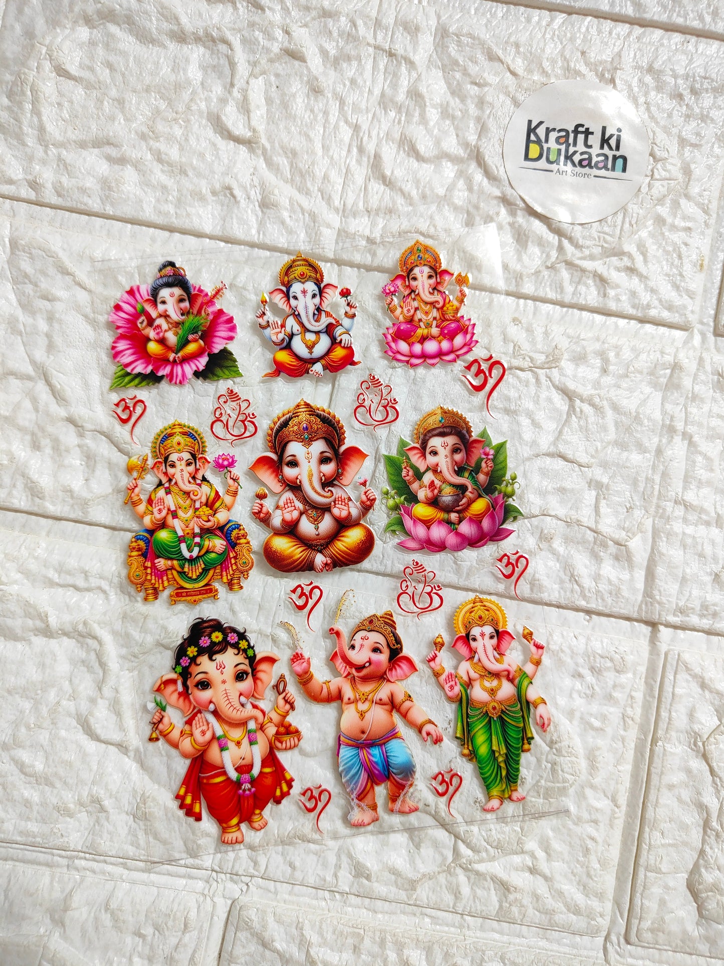 Colorful Ganpati/Ganesha peel-off sticker sheet with multiple deity figures
