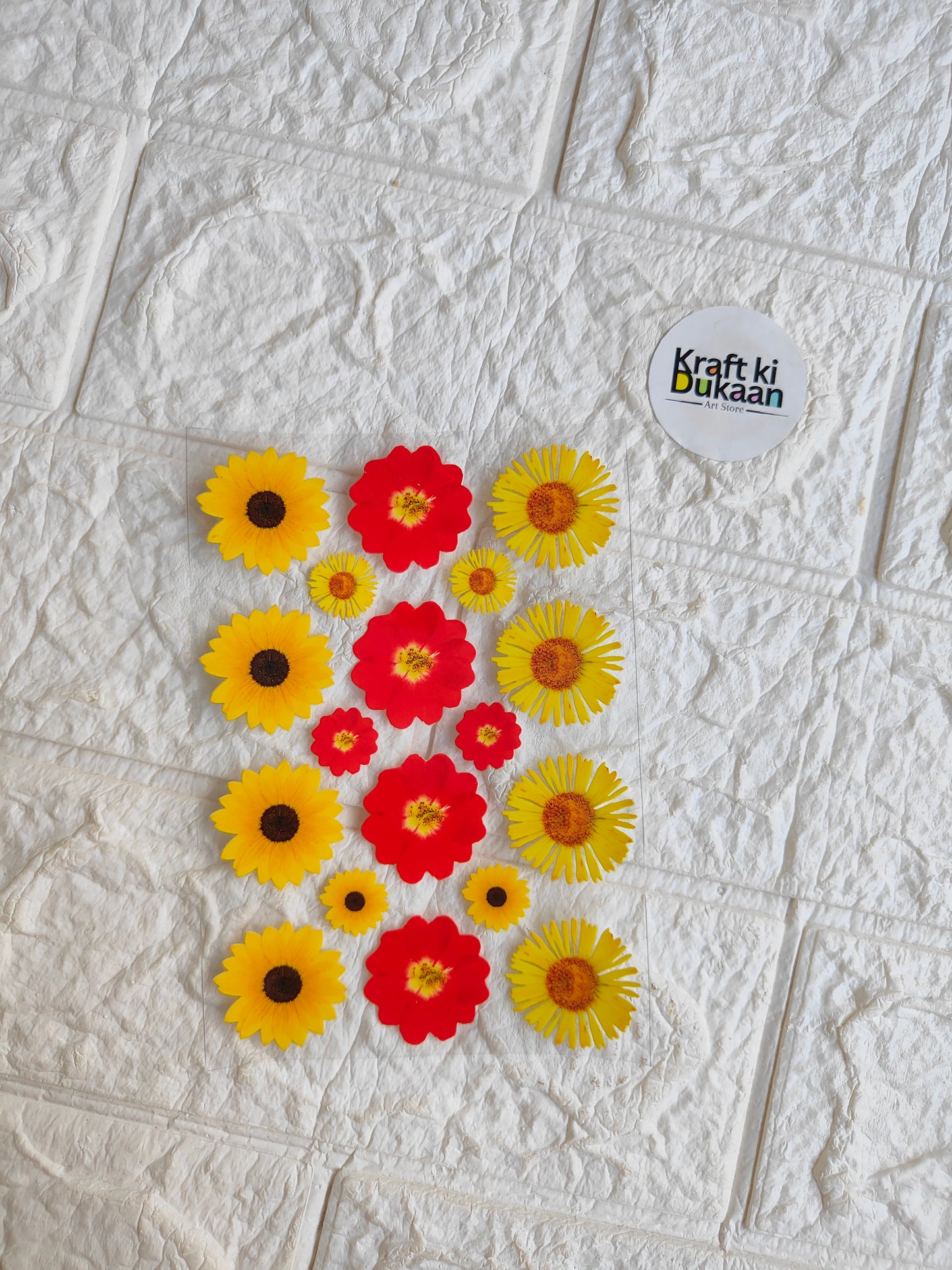 Peel-off sticker sheet with red and yellow flower designs, small sunburst shapes