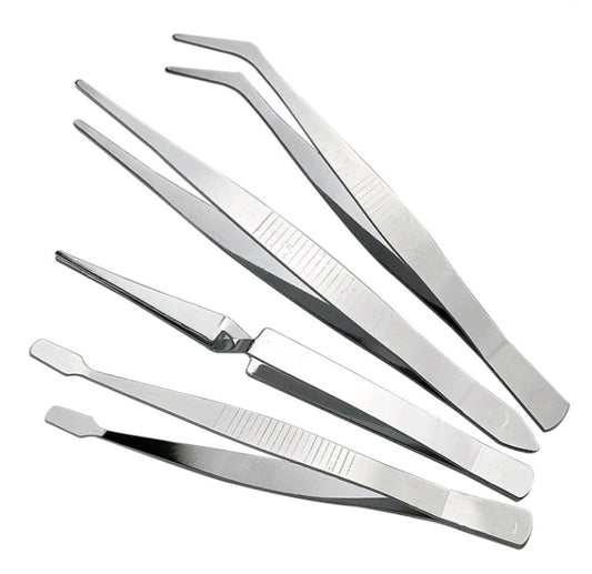 Stainless-steel tweezer set with four angled tips laid out
