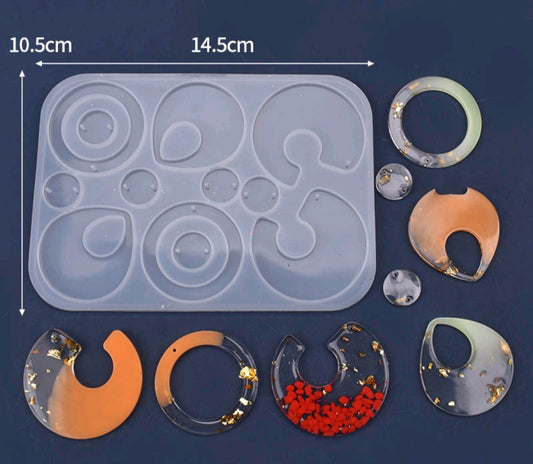 10-cavity jewellery mould, light gray silicone tray with circular and oval cavities