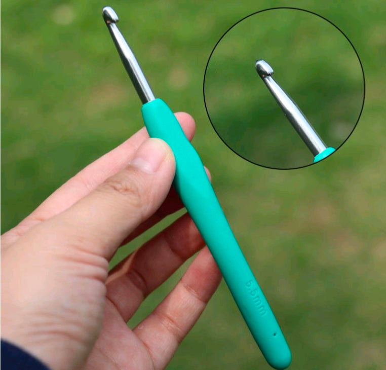 Turquoise knitting needle with silver metal hook tip