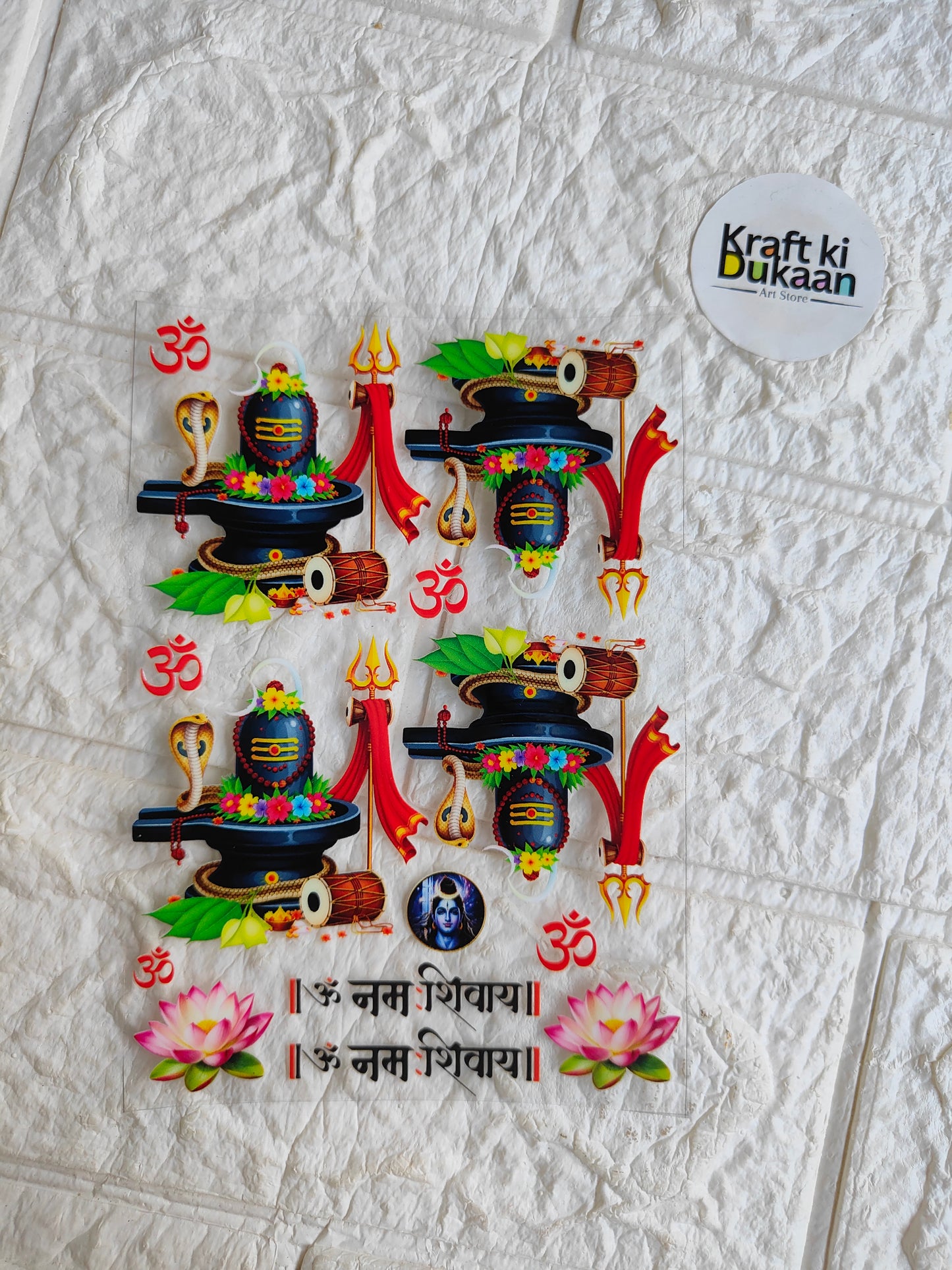 UV DTF peel-off sticker sheet with colorful illustrated idols and Devanagari text
