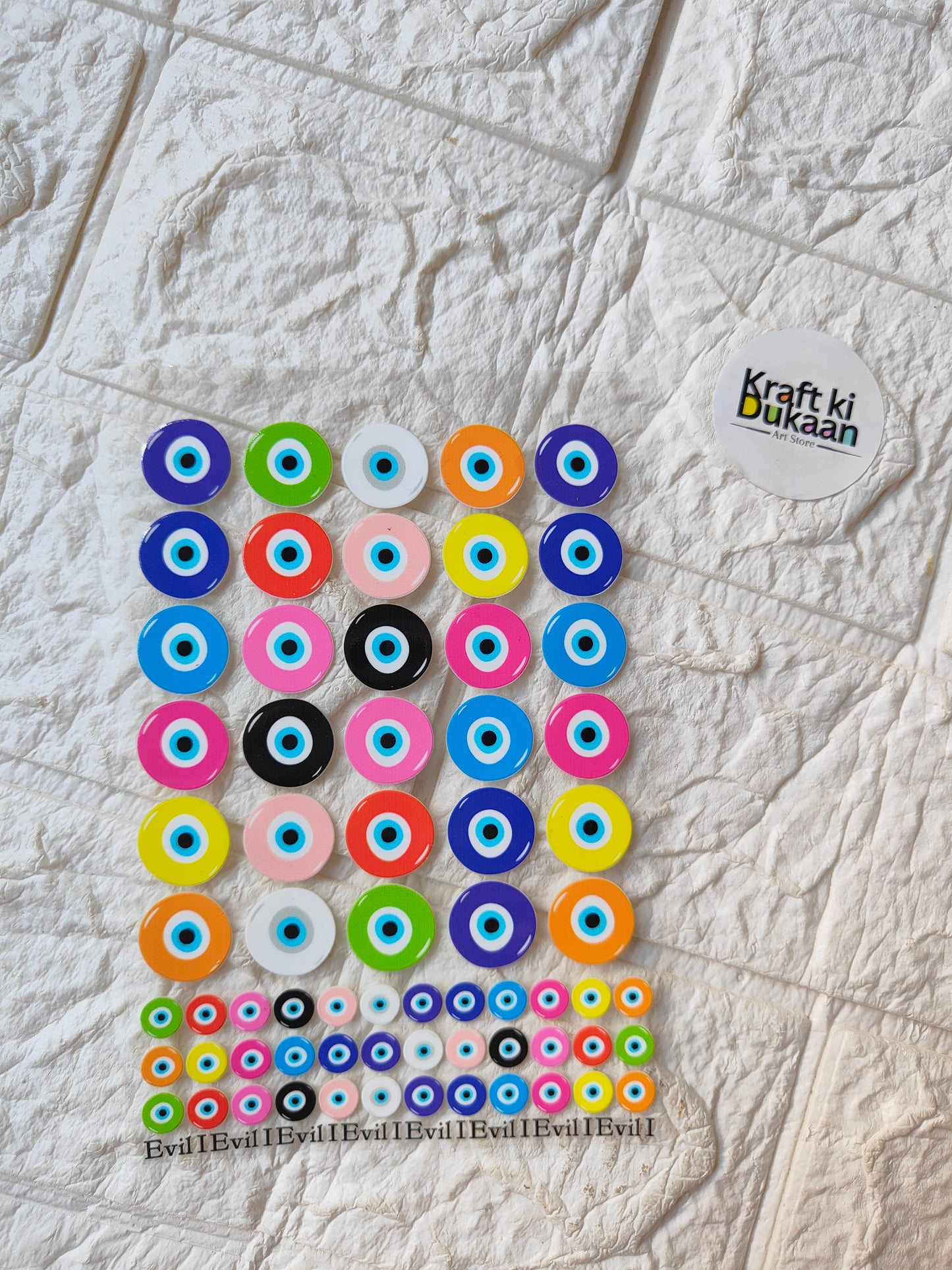 UV DTF peel-off sticker sheet with colorful circular eye-style designs