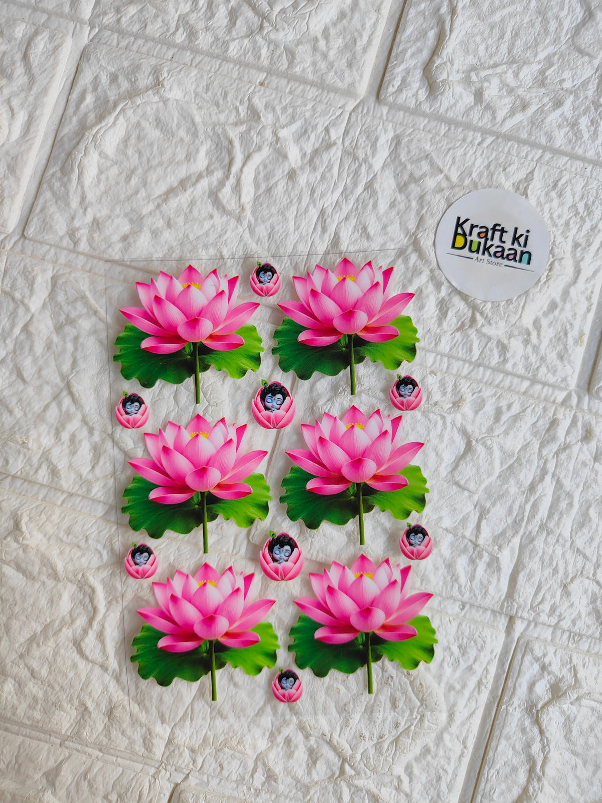 Peel-off sticker sheet with pink lotus flowers, green leaves, and oval centers