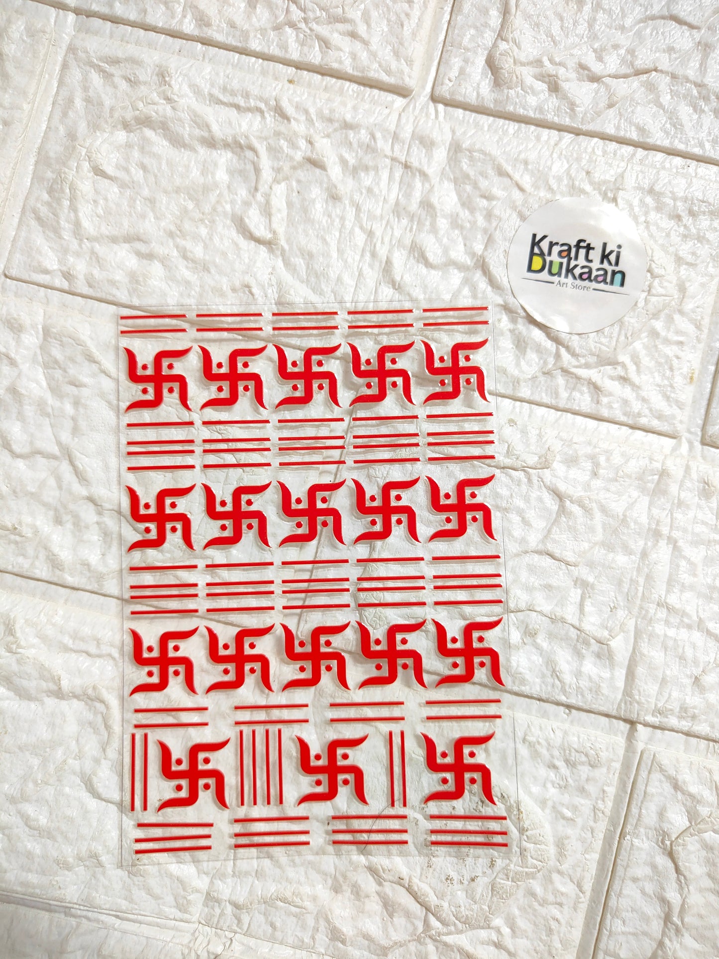 Peel-off decorative sticker sheet with red patterned festive motifs