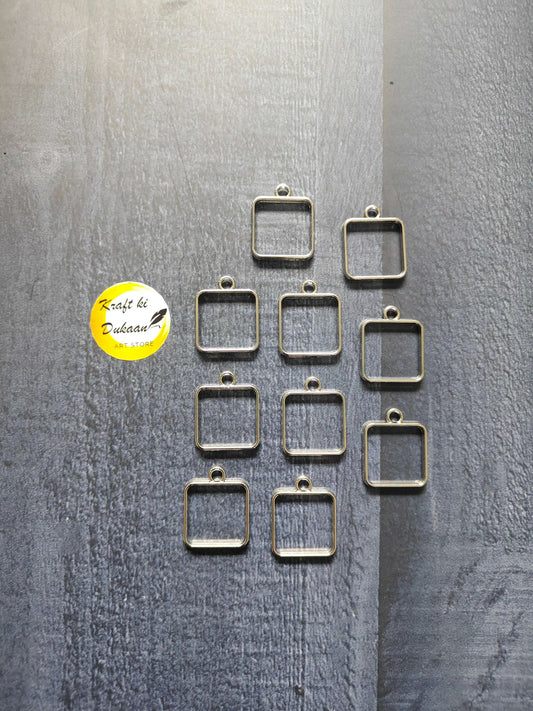 Square plain bezel pendants (10) in silver tone, top loop bail for chain