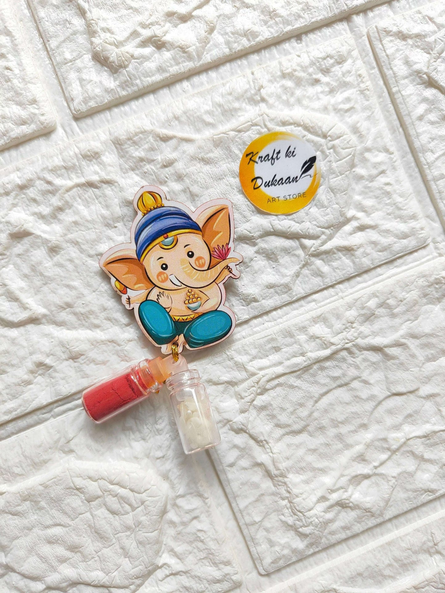 roli-chawal-bottle-set-elephant-illustration-with-two-colorful-bottles