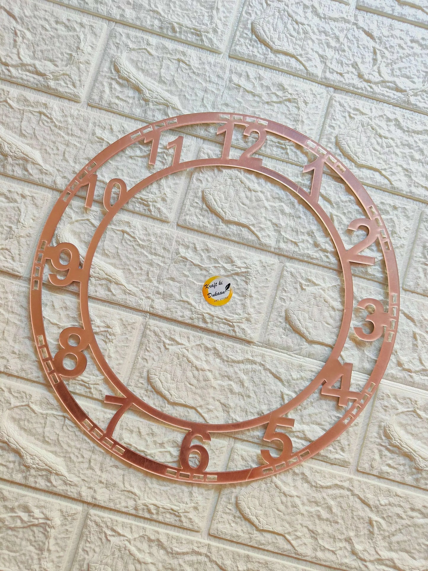 Rose gold acrylic clock number ring with inner cutout and outer raised numerals
