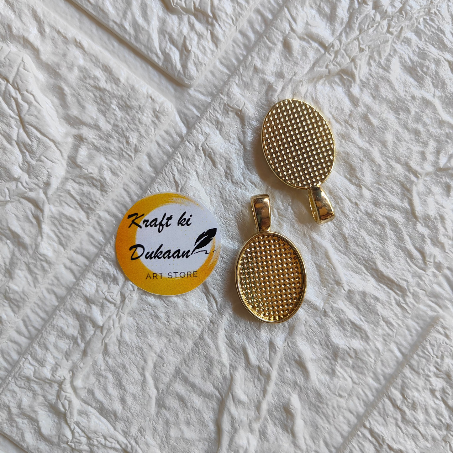 Gold round pendant set for jewelry featuring textured design by Kraft ki Dukaan