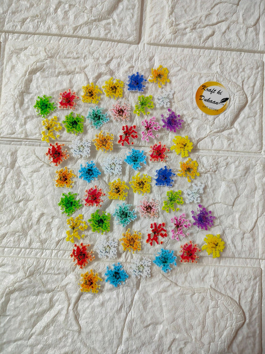 Peel-off sticker sheet with multicolor flower-shaped decals, circular layout on sheet