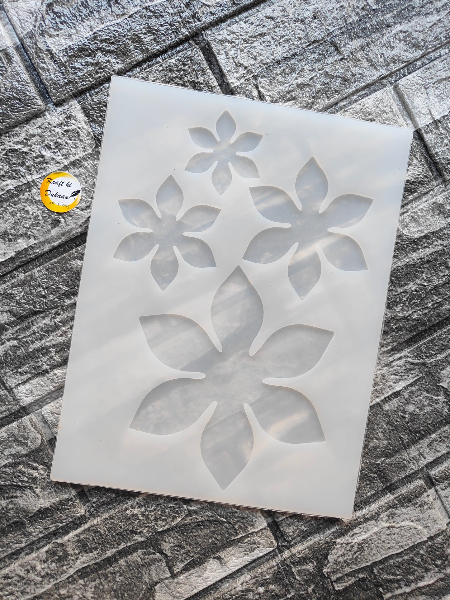 Silicone 4 cavity flower mold with four distinct flower shapes for baking and crafting projects