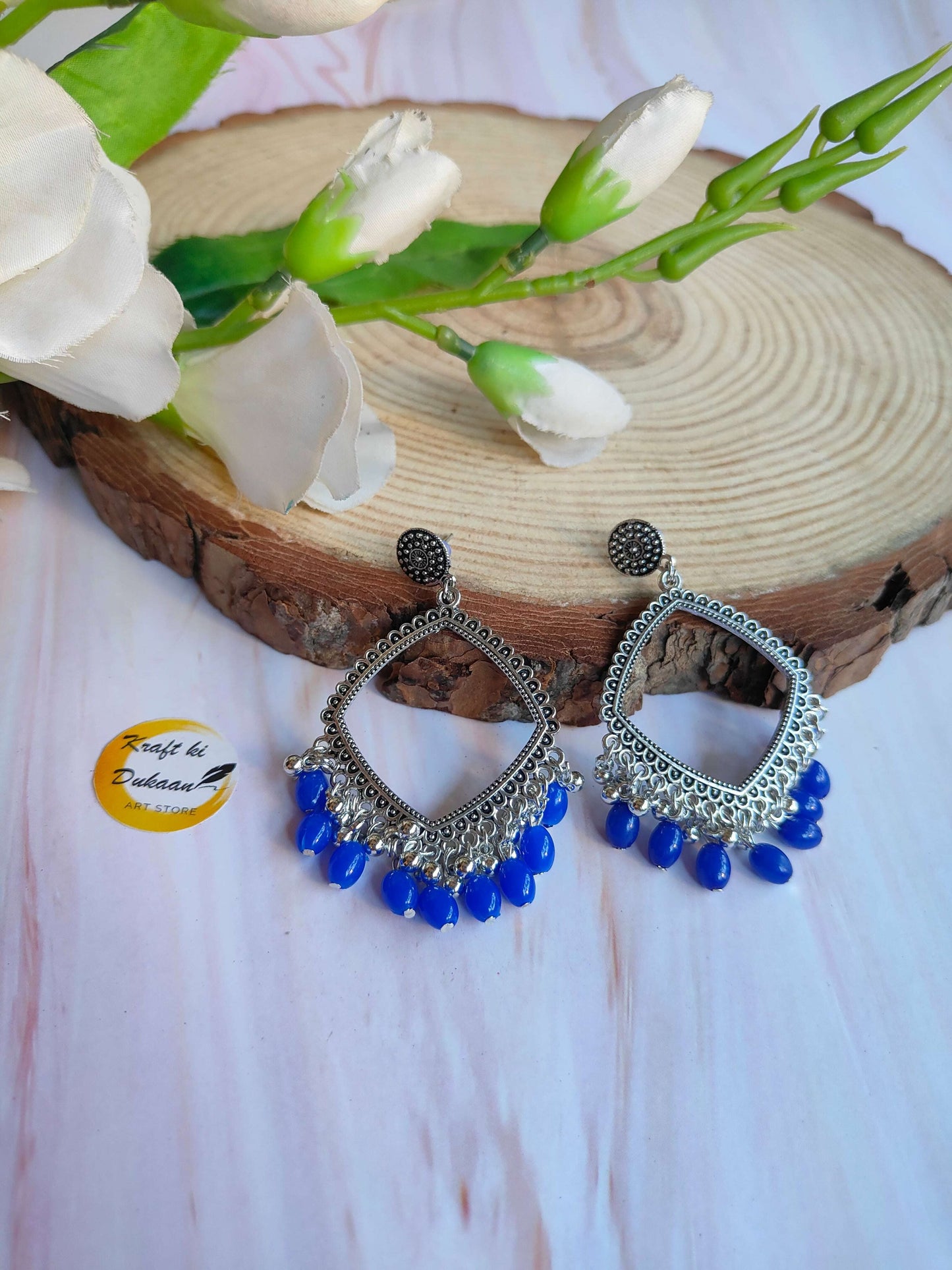 silver-jhumka-earrings-blue-bead-statement-pieces