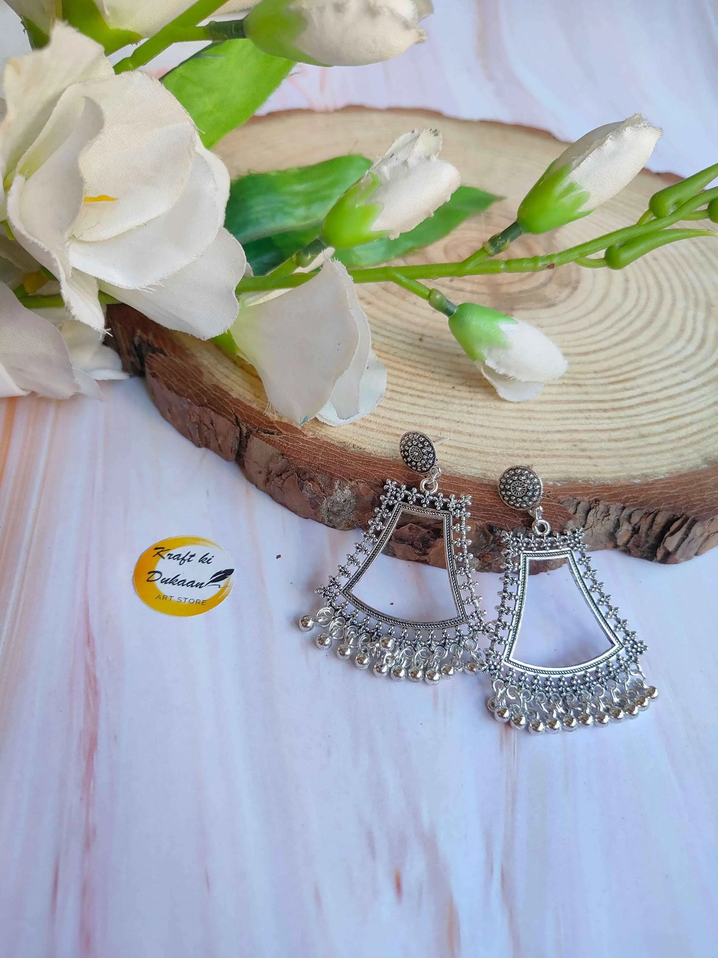Silver Jhumka without Beads: triangular dangling jhumka earrings with round top and fringe