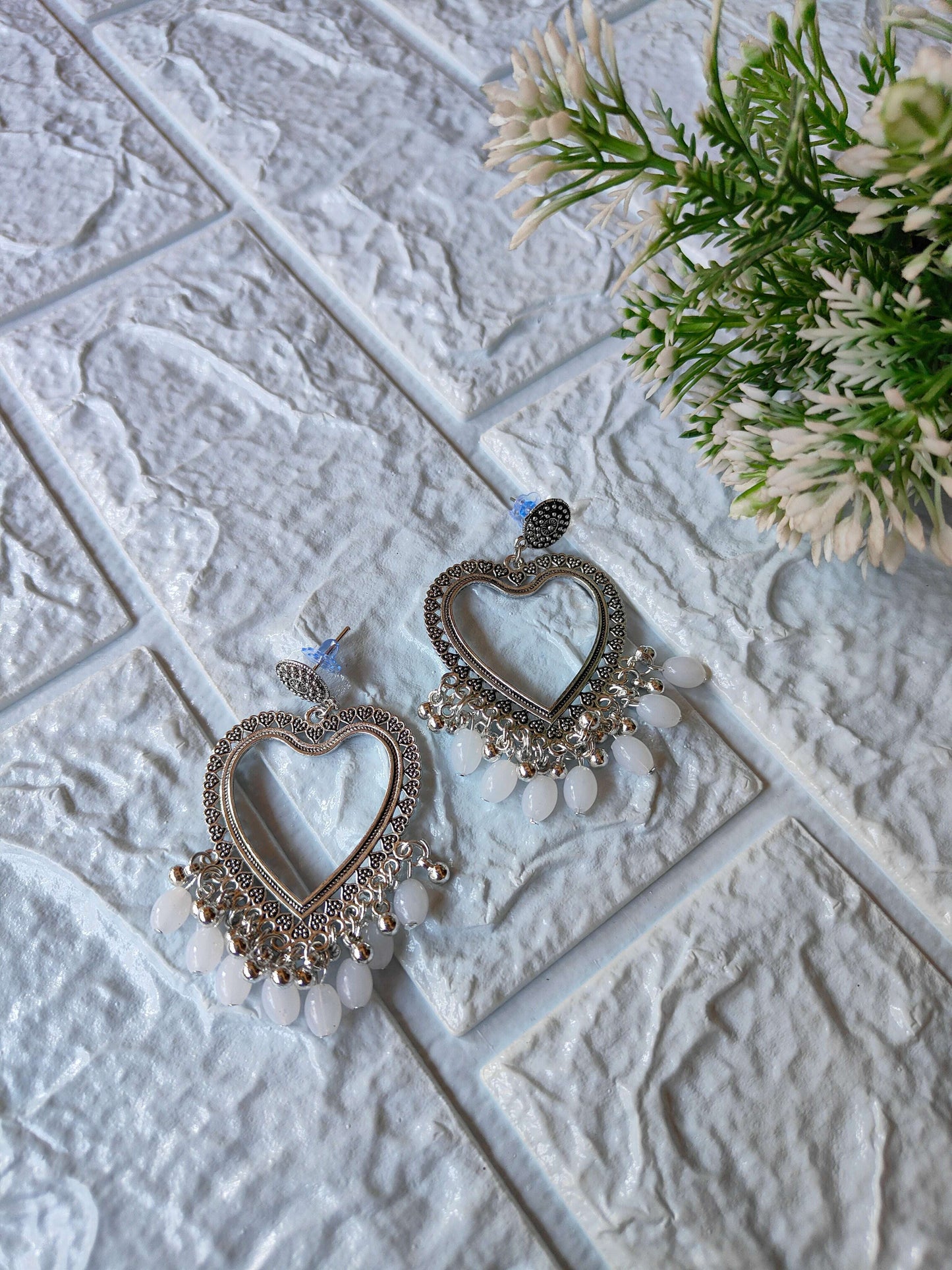 silver-jhumka-earrings-with-beads-heart-shape-2