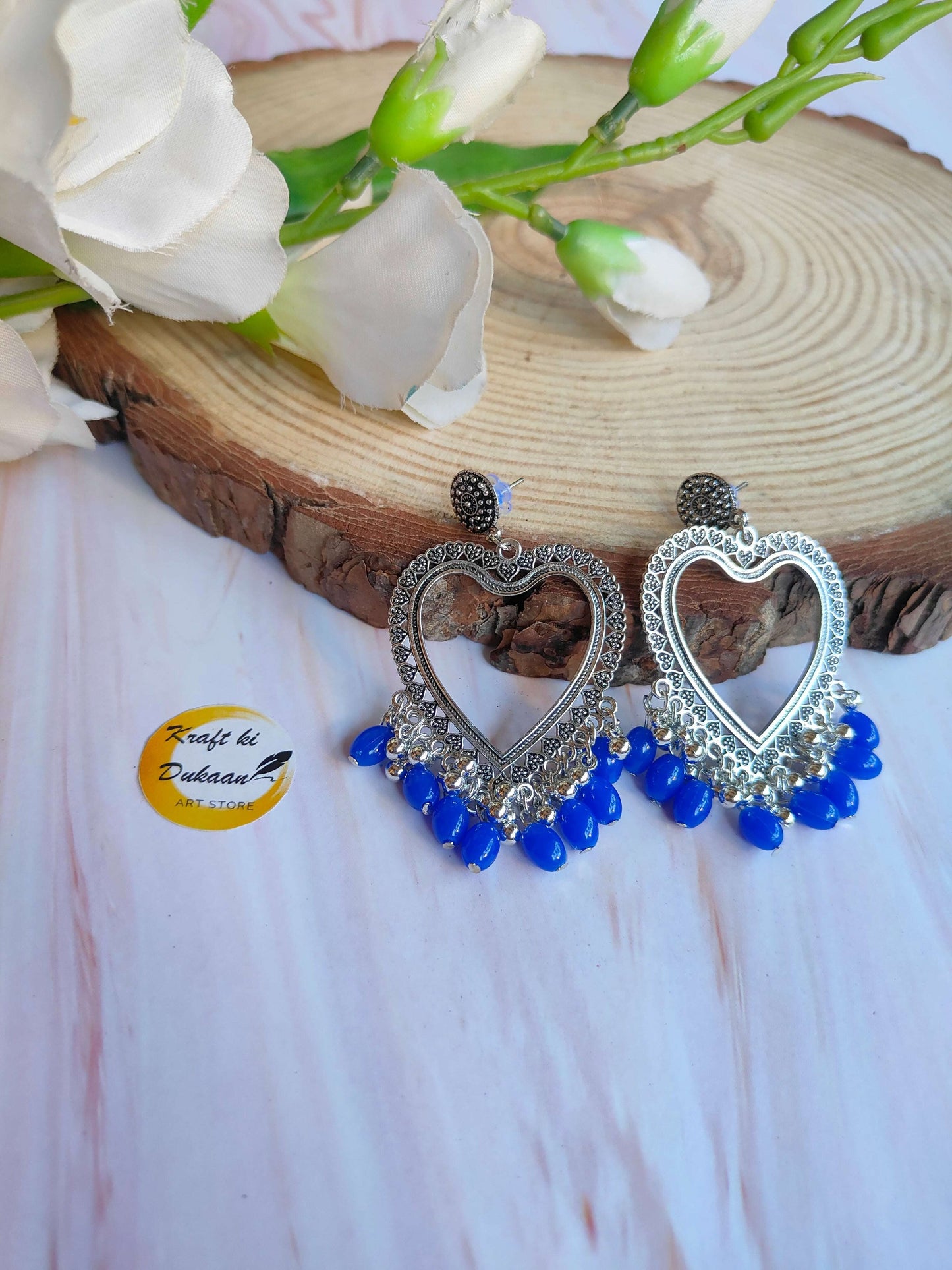 silver-jhumka-earrings-with-blue-beads-heart-design