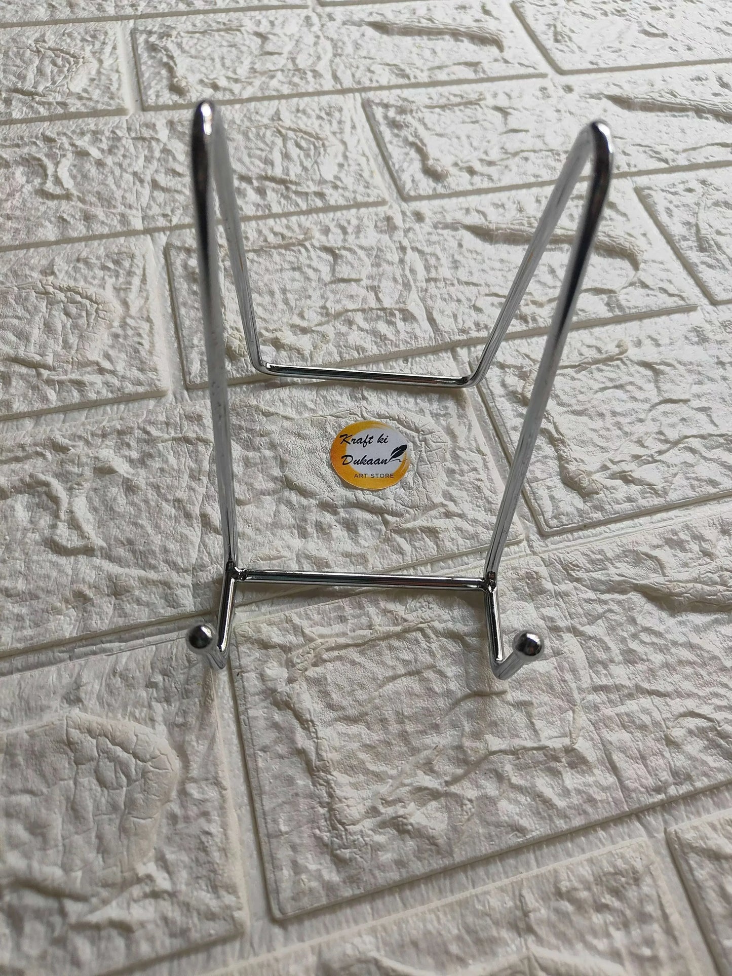 Silver metal stand D: two tall legs, U-top frame and horizontal bottom bar with pins