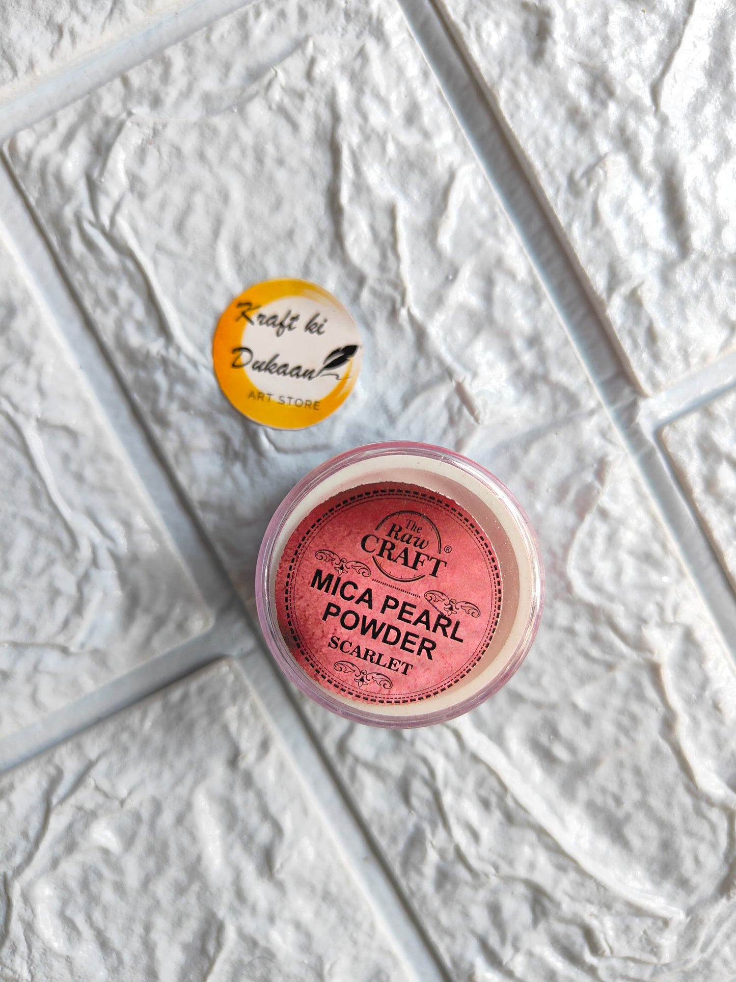 Scarlet MICA pearl powder for resin in a clear container by Kraft ki Dukaan