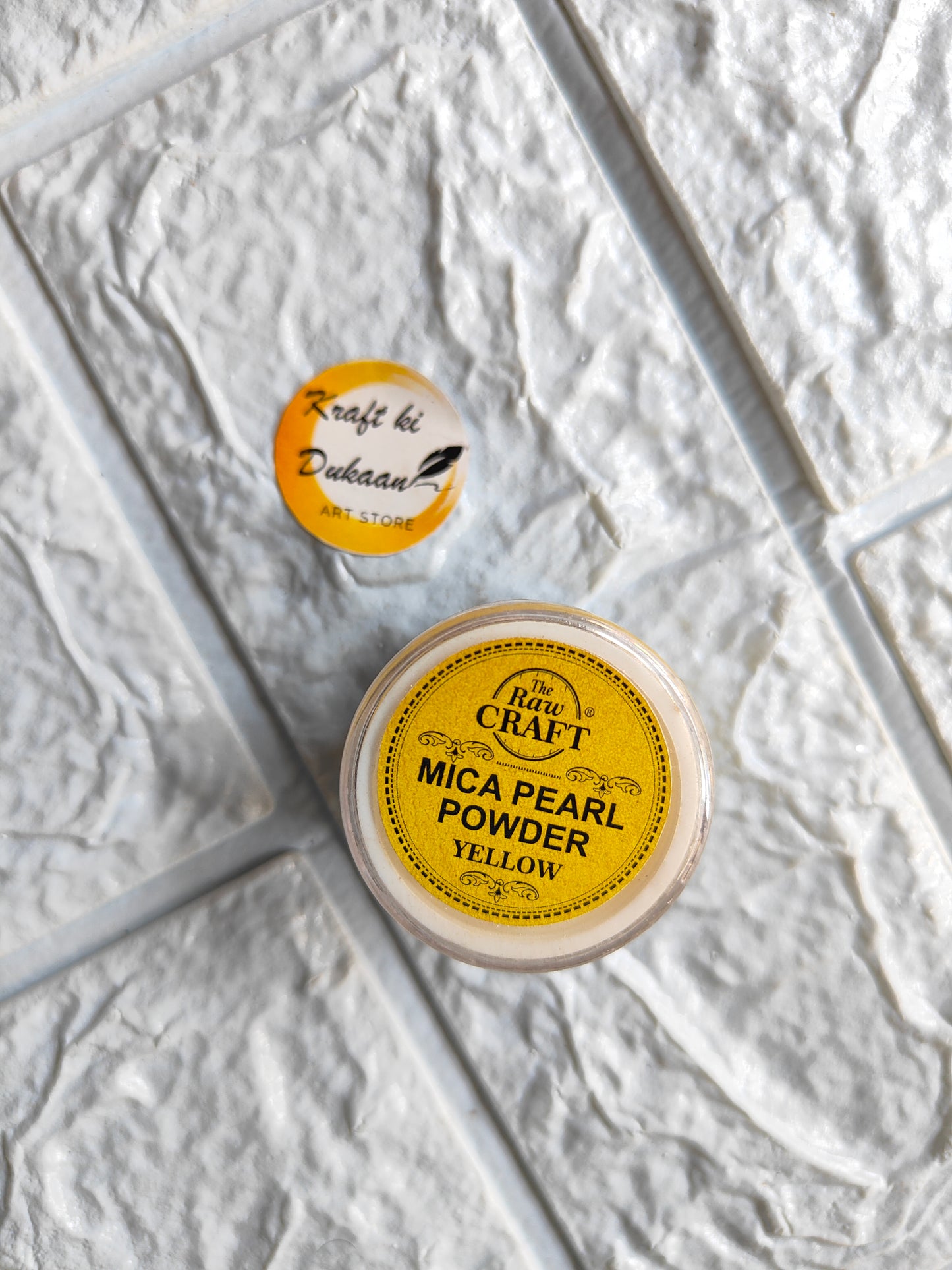 Kraft ki Dukaan MICA pearl powder for resin in yellow shade in a clear jar