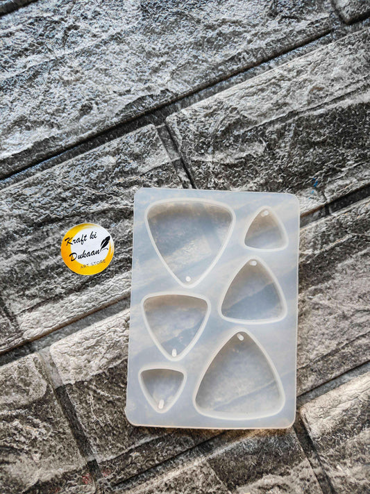 Triangle mould sheet showing six cavity triangles in a row