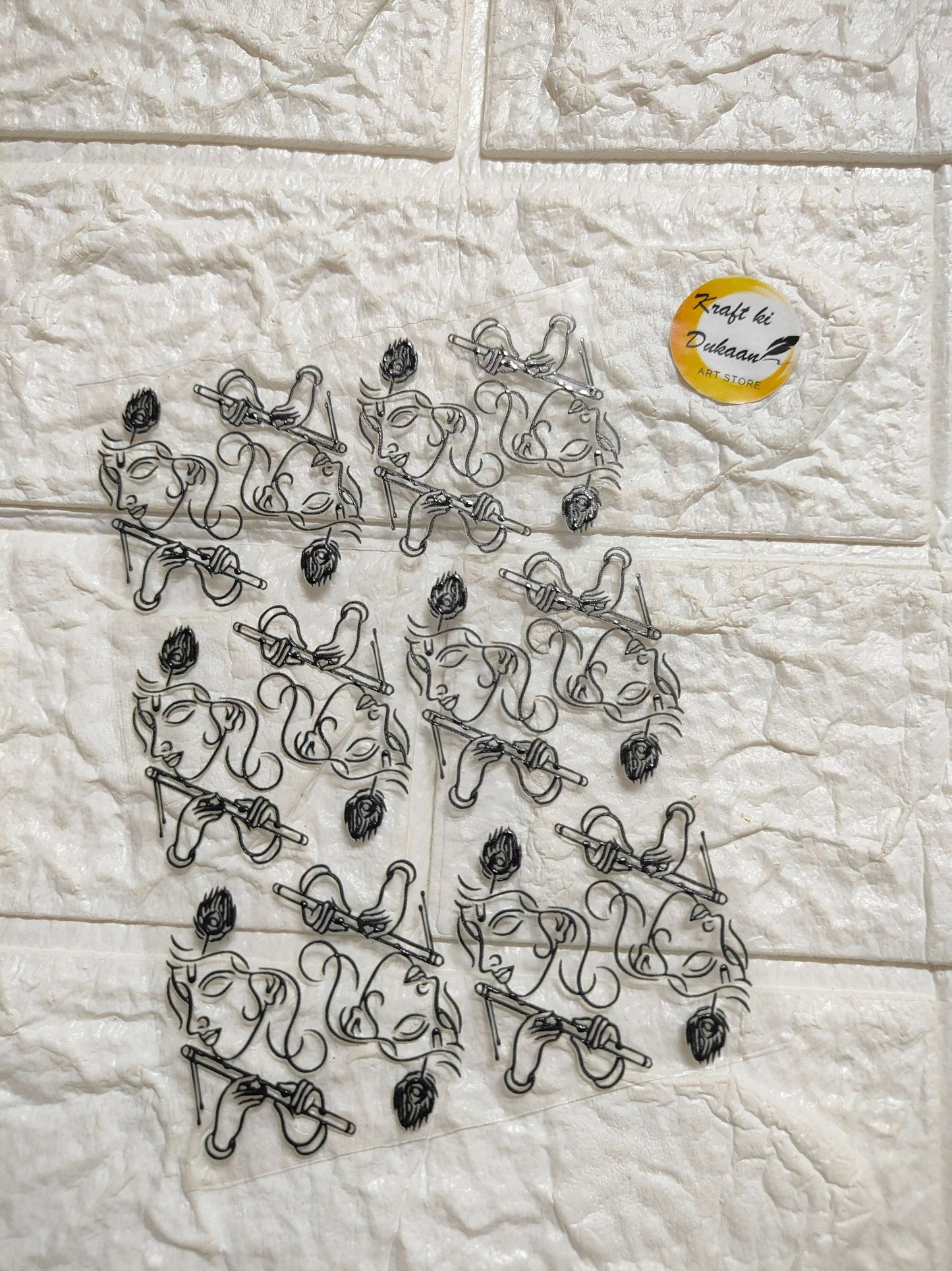 UV DTF peel-off sticker sheet J35 with black ornate trumpet-floral motifs