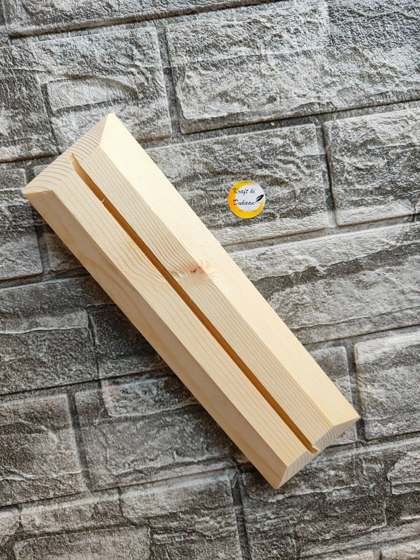 Wooden name plate stand, angled view of long groove and smooth plank edges