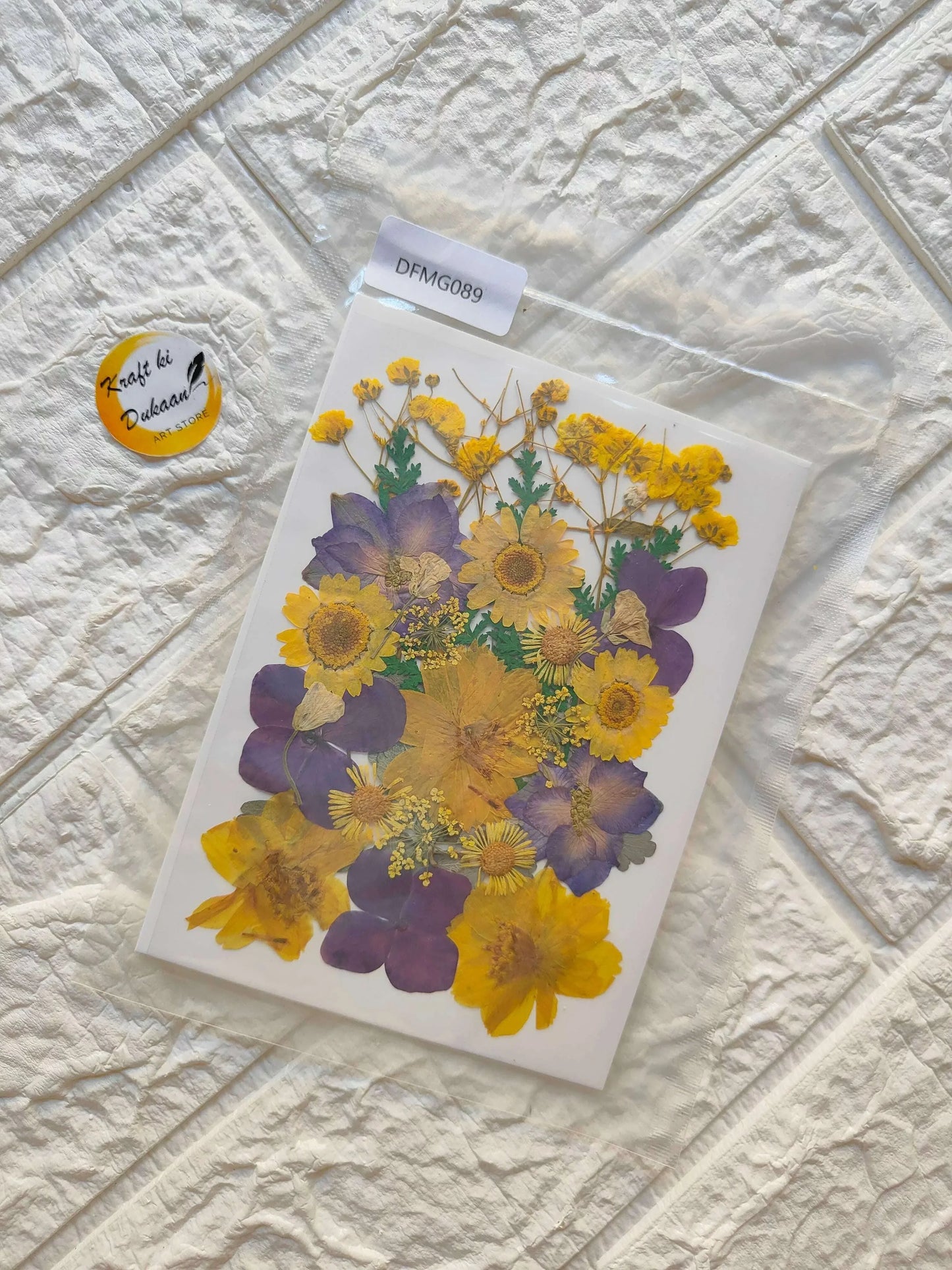 Pressed Flower Sheet Mix B9 with yellow and purple pressed blooms on clear backing