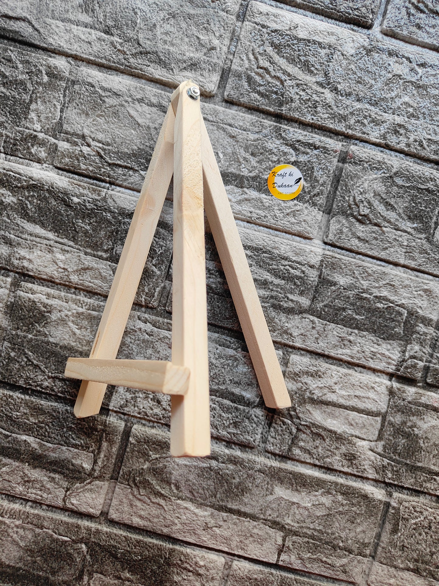 10 inch wooden easel stand with a minimalist design for displaying artwork or photos