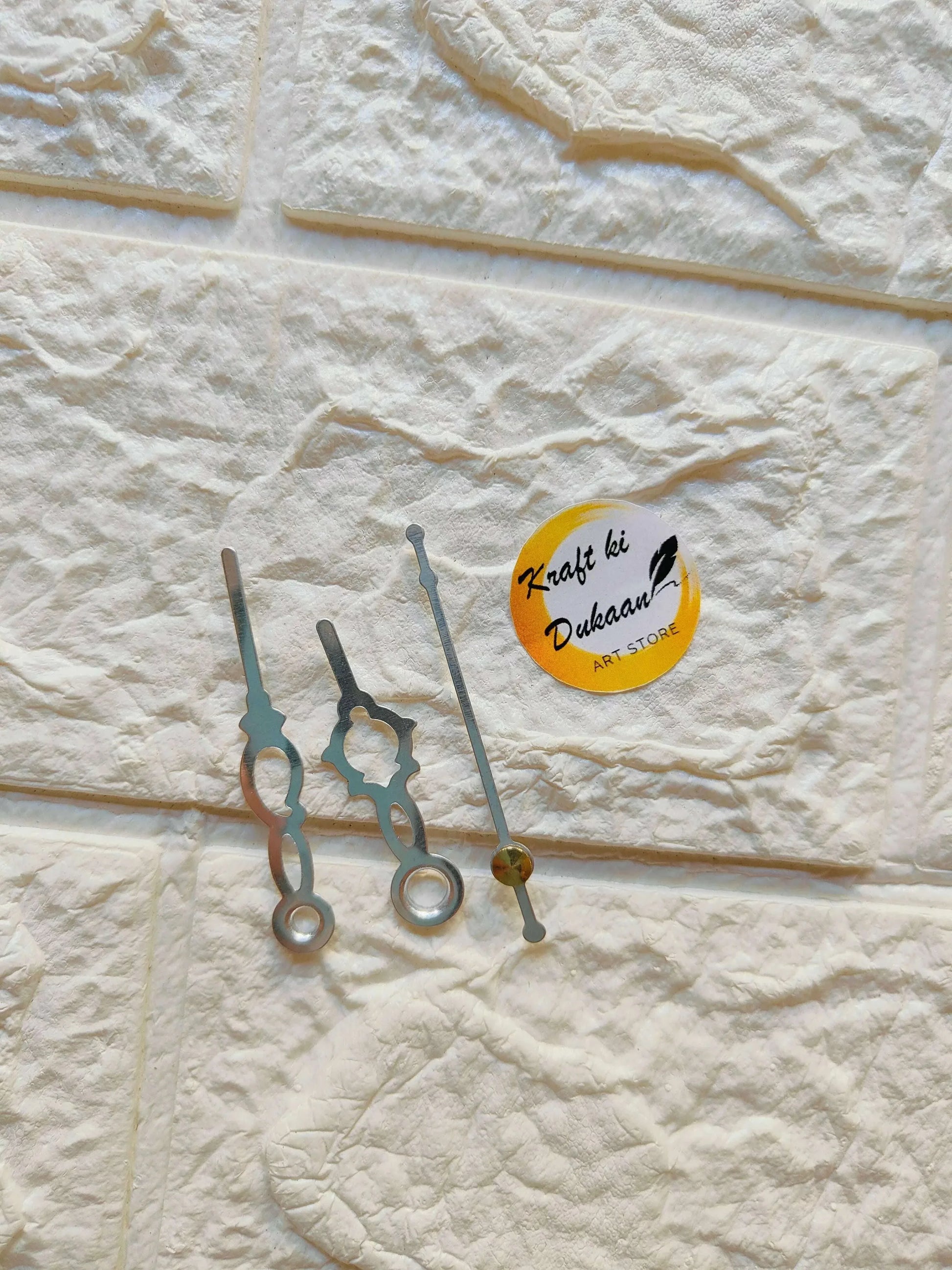 Clock hands A32 in silver metal, circular center and long pointer hands