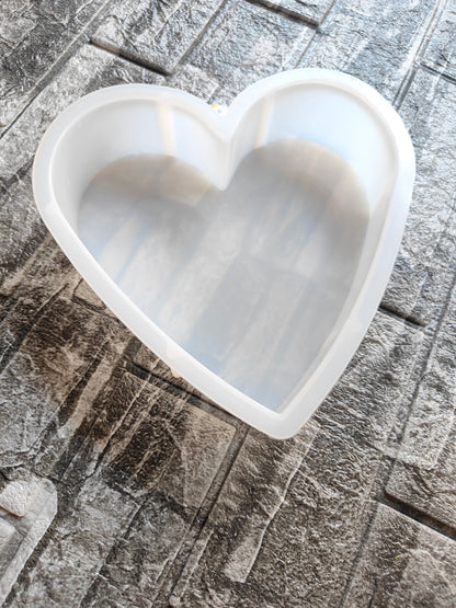 8 inch deep heart mould for resin on a textured surface for crafting and DIY projects