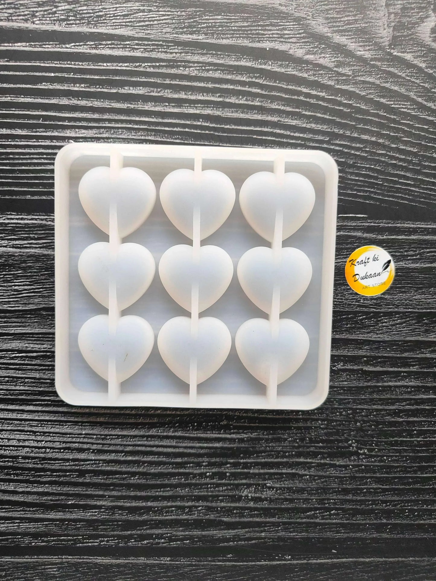 Square heart mould with 3x3 cavities and raised divider posts