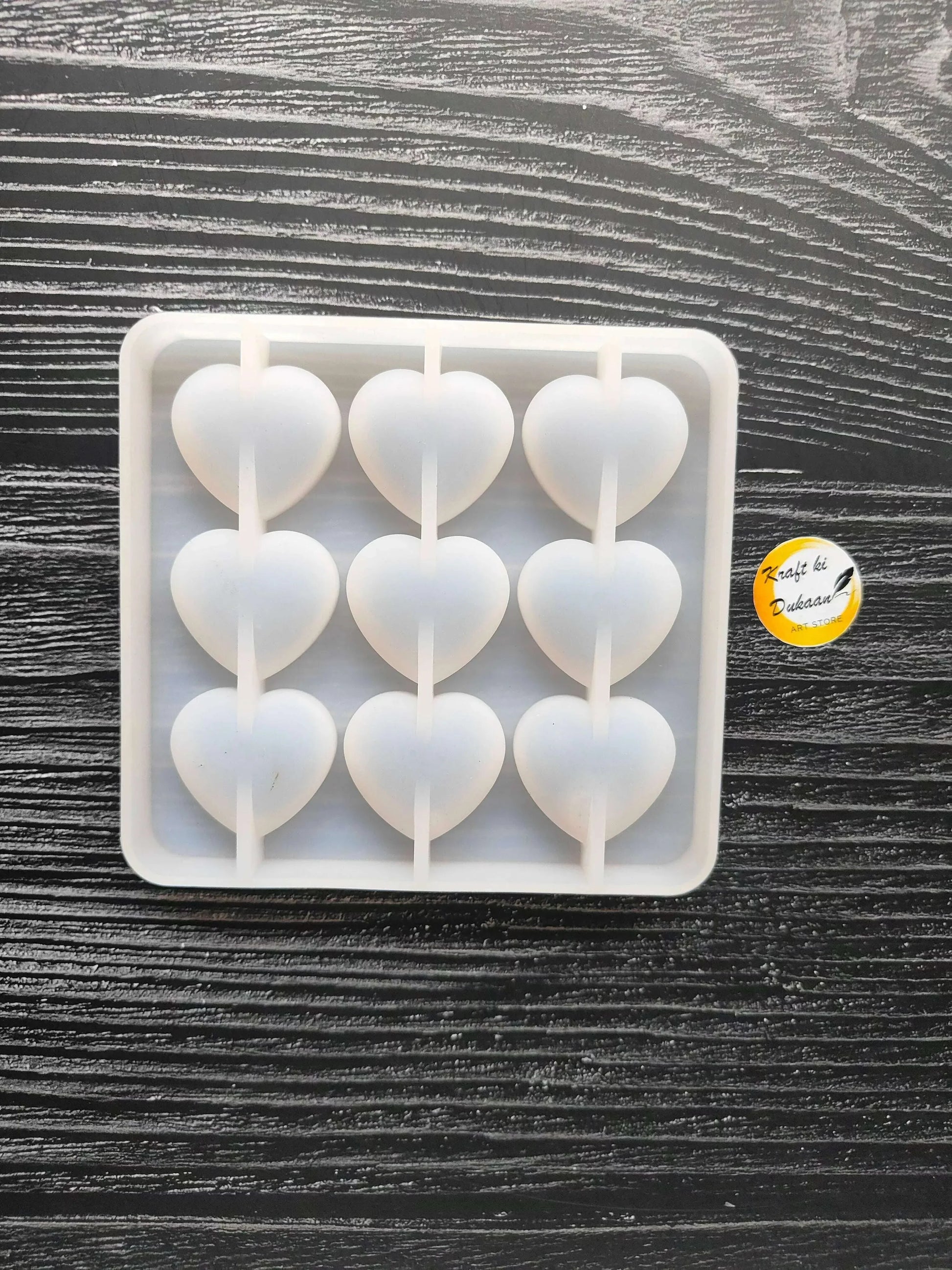 Square heart mould with 3x3 cavities and raised divider posts
