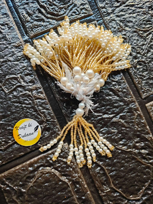 Latkan A15: white pearl and gold beaded tassel with braided cord detail