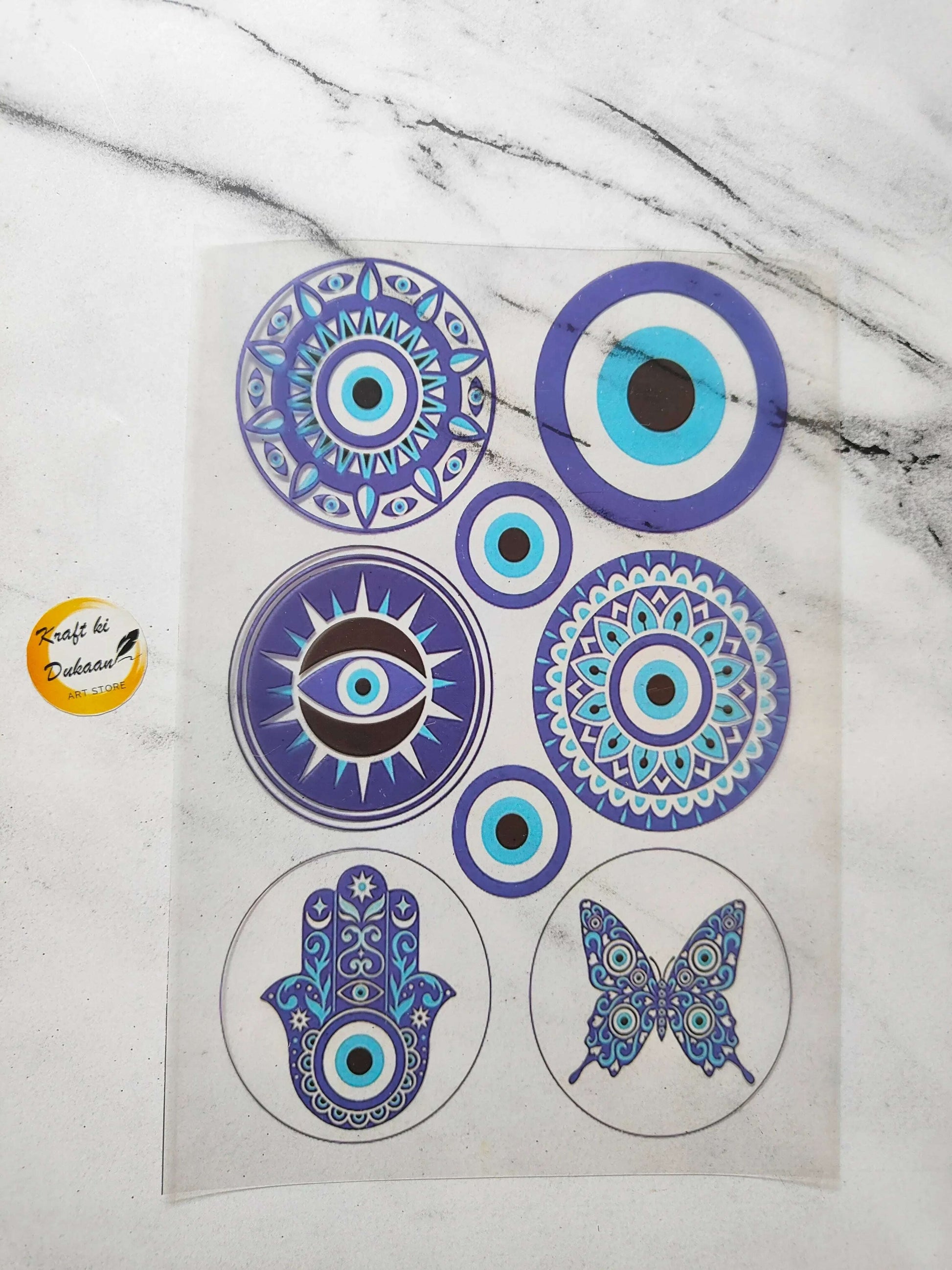 A5 Insert Sheet E6 with purple and blue circular eye motifs on a sheet