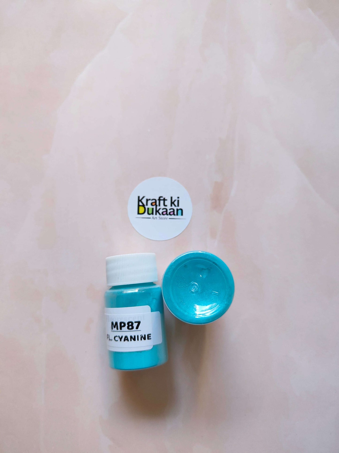 MICA powder jar, fluorescent cyan (MP87), with open lid showing powder