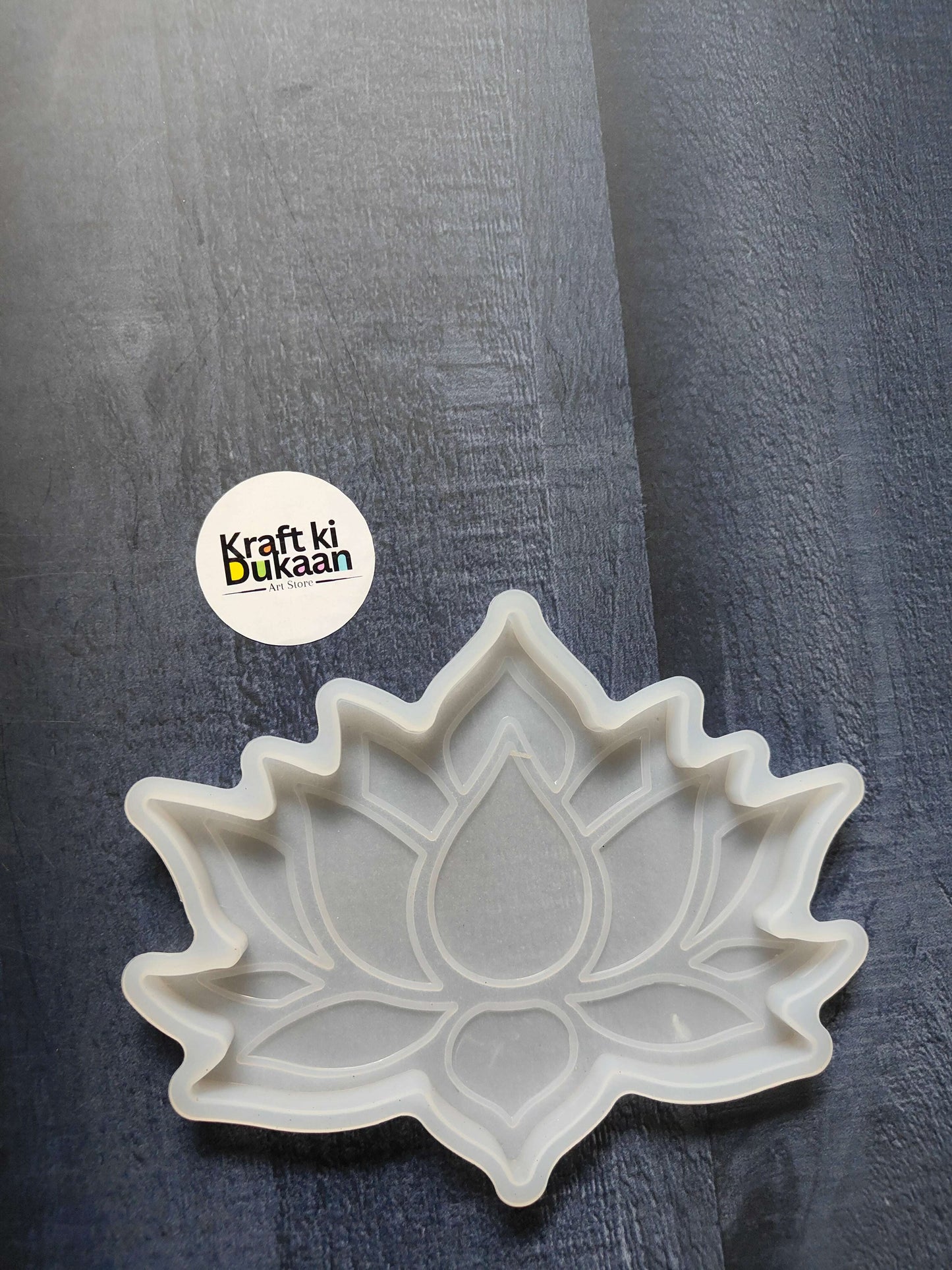 Lotus flower coaster mould with scalloped petals and leaf-shaped center