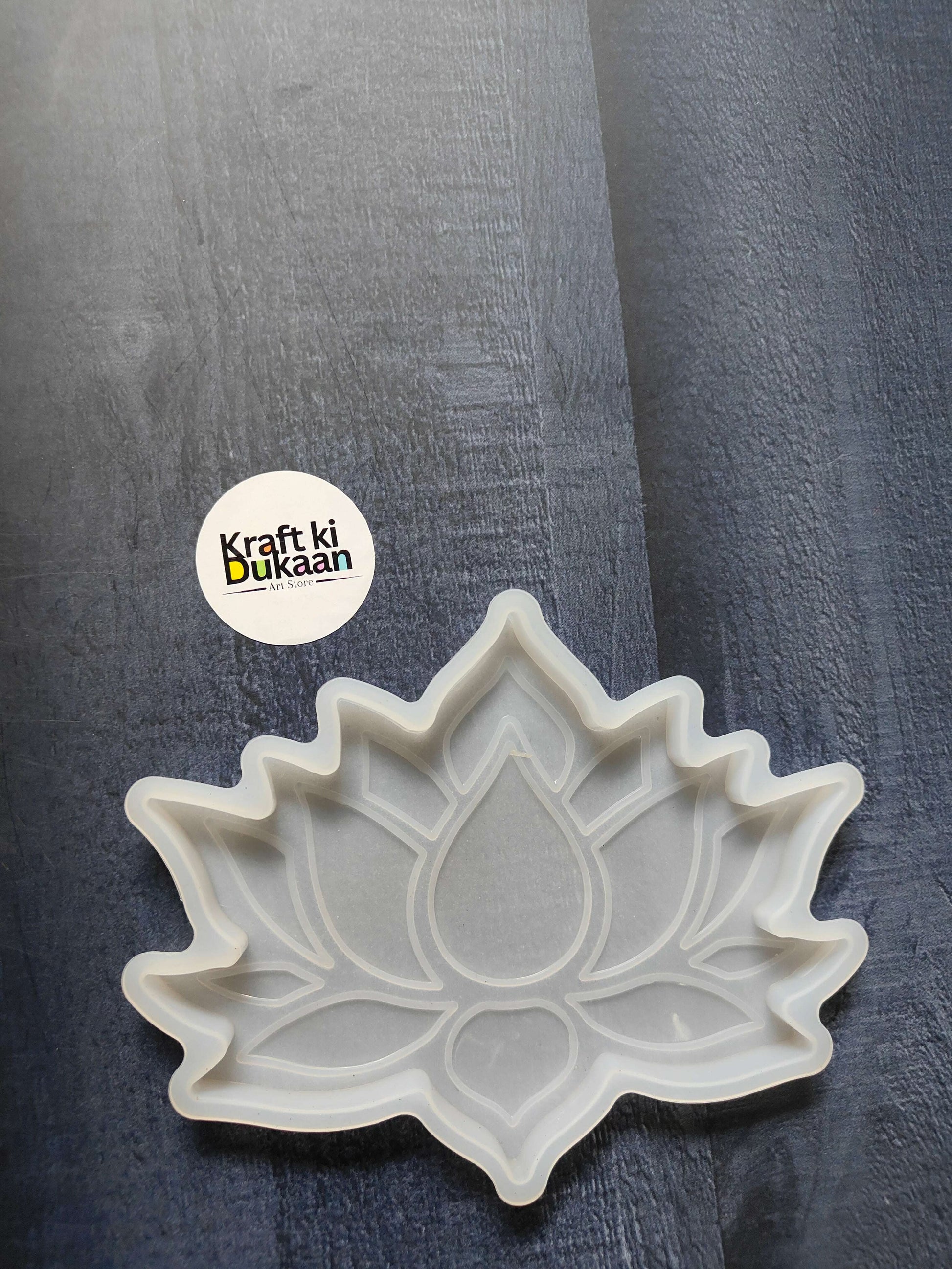 Lotus flower coaster mould with scalloped petals and leaf-shaped center