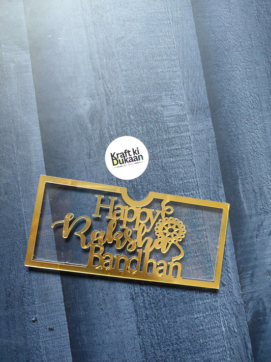 Acrylic Golden Rakhi Envelope A2 with “Happy Raksha Bandhan” gold text design